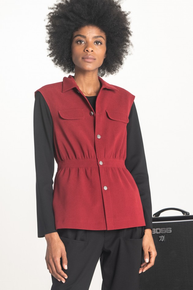 Gilet with fitted waist