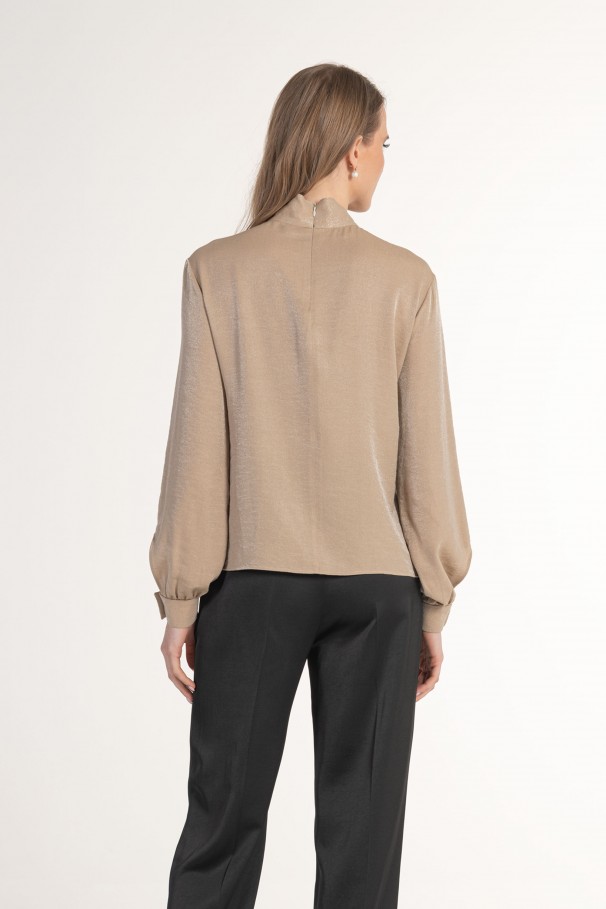 Blouse paillete avec noeud